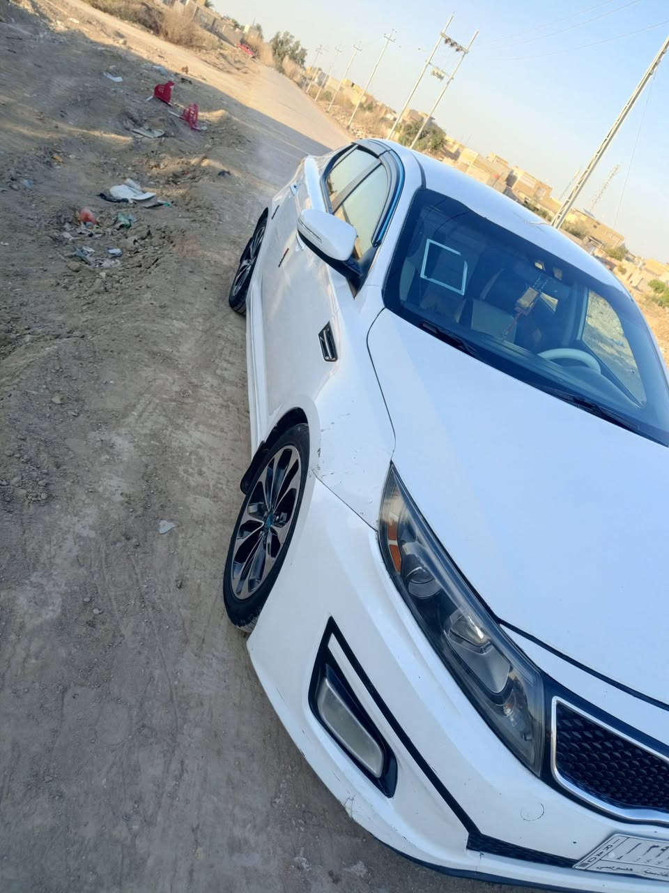 سلام عليكم اوبتيما موديل 2014امريكي ضربته شبر بجاملغ موضح بصوره لباقي كفاله عامه مكينه كير حداديه تخم تاير ترايك وين ماتريد رقم قادسيا  الرقم ***********
