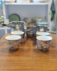 طقم ركوات • ستيل • ٤ فناجين