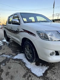 للبيع تيوتا هايلوكس. 2014.  رقم بغداد دولي بسمي. سنويه لل28. مجدده.   ...