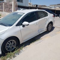 كورلا موديل 2022 وارد امريكي ماشيه 68 الف مايل هايبرد رقم بغداد صورة ا...