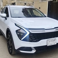 سبورتج 2023 شركه دوليه   بدون صبغ مكفوله من تبديل  ماشيه 45 الف  مواصف...