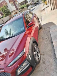 للبيع كونا 2018  رقم بغداد لون احمر بصمه  تدفئة تبريد كشنات 3 انظمة قي...