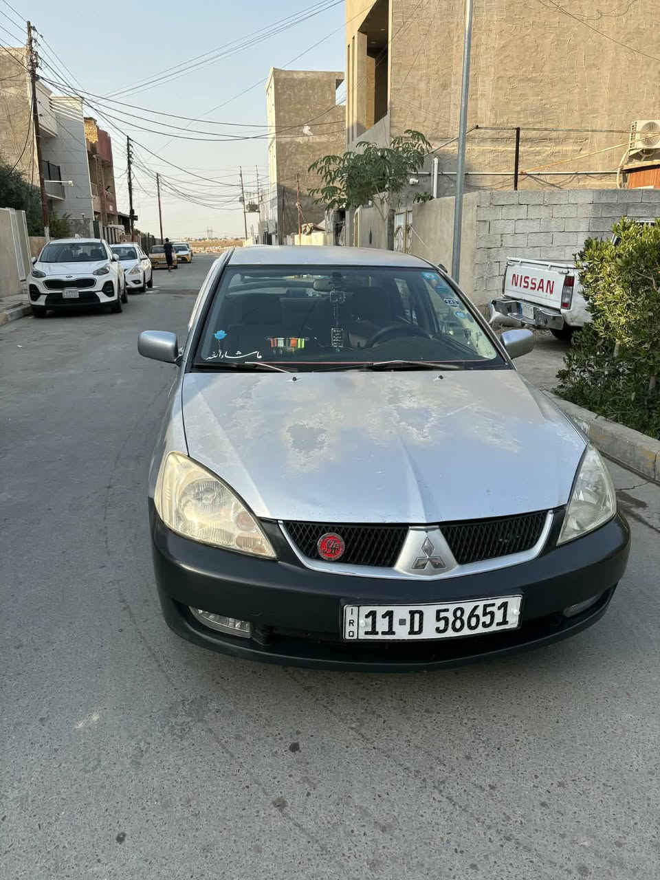 لانسر موديل 2009رقم بغداد الدولي سنوية لل2030 للبيع مكينة وكير كفالة عامة السيارة بلادية بيها صبغ بس باب السيايق مسجل شاشة اندر ويد كامرة خلفية تبريد ثلج صدر امامي خلفي جديد ادامة كاملة مابيها نقص برغي شغل وطلع وين متريد 
تخم تاير جديد دسكات جدد 
***********
السعر خاص او واتس اب
