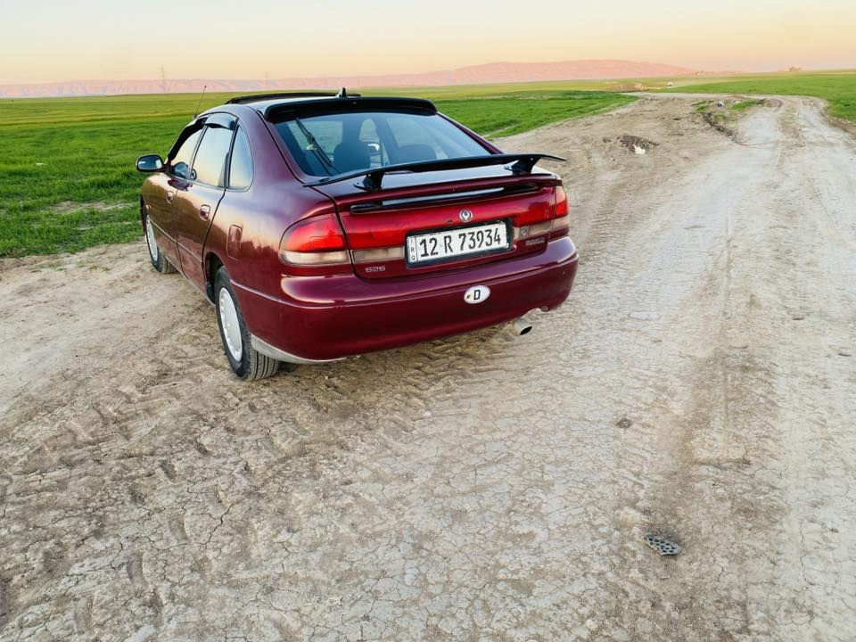 سلام عليكم 
مازدا فاصوليا 
موديل 95
رقم نينوى إنكليزي 
فول بس كير عادي
كير محرك شرط 
تبريد ثلج 
***********
