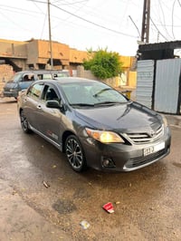 كورلا موديل 2009 رقم بغداد انكليزي هزة وسنويه جدد فول واحد على واحد XR...