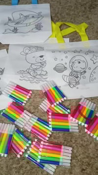 اكياس ١٢ • اقلام تلوين • توزيعات