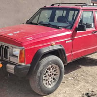 جيب شيروكي موديل ٩٣ مكينه وكير ونجي مكفولات 07735449552