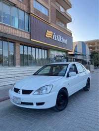 لانسر ٢٠١١ • تسجيل ٢٠٢٨ • ماكو اقساط