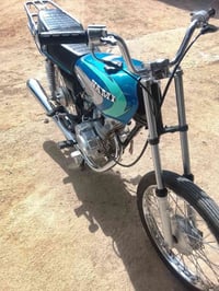 نامه 25 • كلك داوات • دراجة نارية