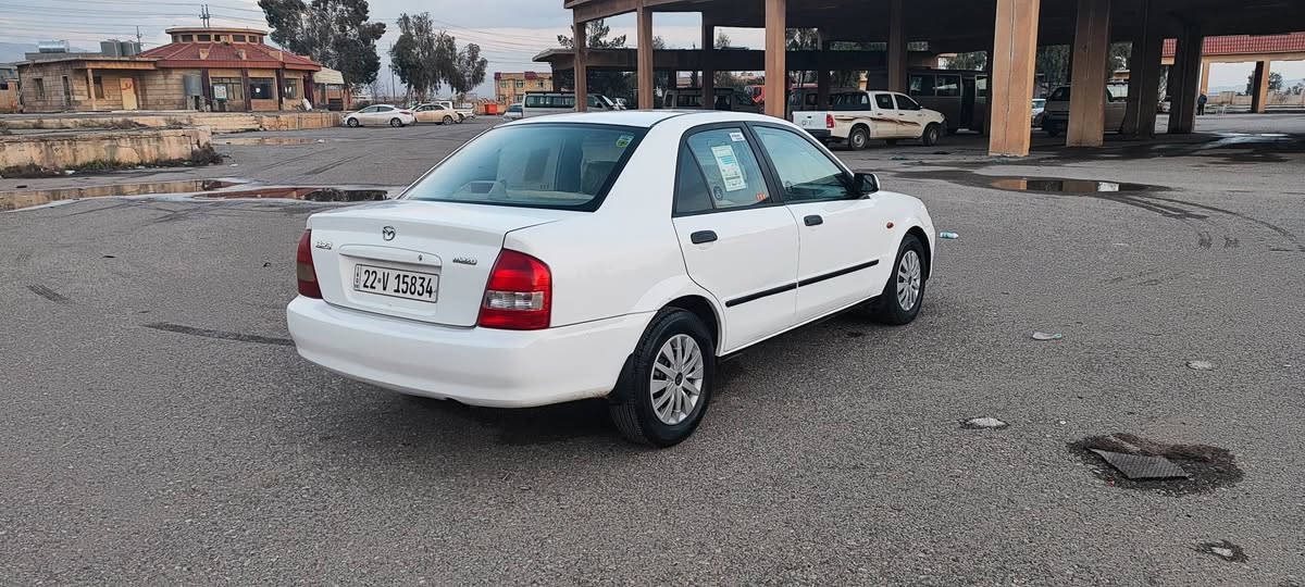 ما زده 323 مۆدیل 2004 گیڕ عادی گیڕ مه کینه به شه رت سه نه وی نویه تا 2029 چوا ر تا یه ی نویی له ژیره زۆ ر تو ندو به نده ده عمو لید رای نیه سبو غ عا مه له سه ر سا غه ی نرخ 49گه ڵا ژ.م ***********کۆیه كويسينجاك, أربيل
