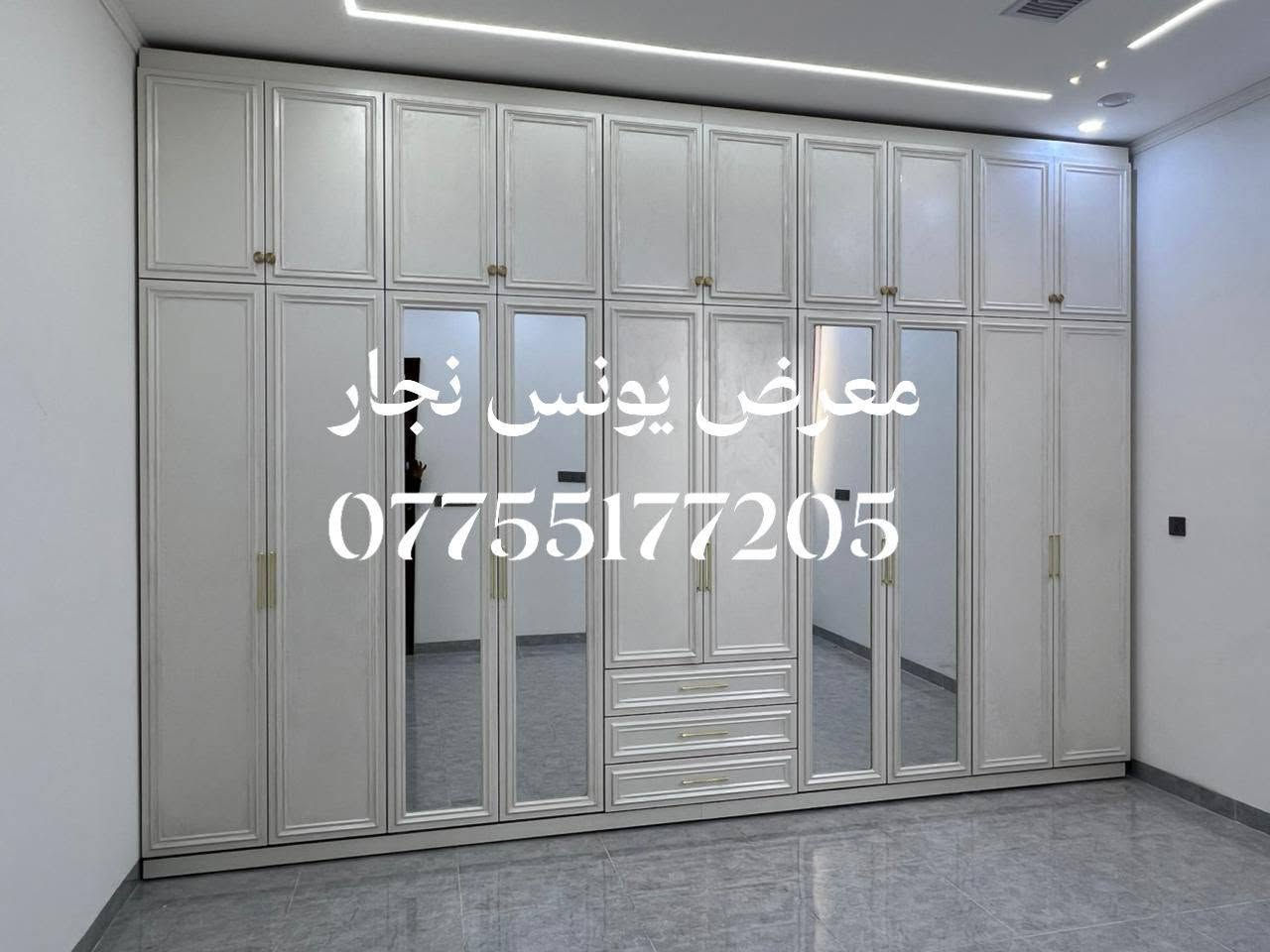 العنوان كركوك مقابل دوميز معرض يونس نجار ***********
