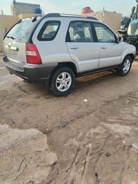 سبورتج 2005رقم شمالي 6سلندر فور ويل فول مواصفات  كروس سرعه  تحكم بالمر...