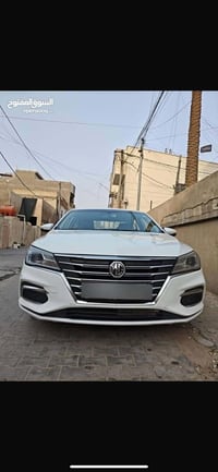 Mg 2023 اللون ابيض  كير أوتوماتيك  محرك كير مكفول  كروز سرعه  مري كهرب...