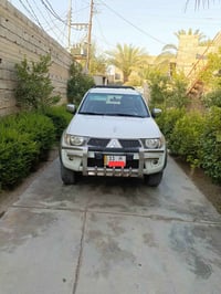 متسيبوشي بنزين موديل 2015سيارة نضيفة حيل ماشية 200 سعر 160/  077116568...