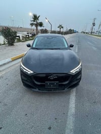 فورد ‏موستينج  2023  كهرباء كامل   لون اسود  قاطعه مسافة 23 الف بطارية...