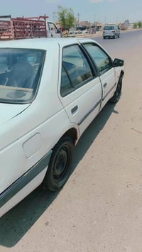 بيجو 405 السعر 25 بيه مجال 07721663484