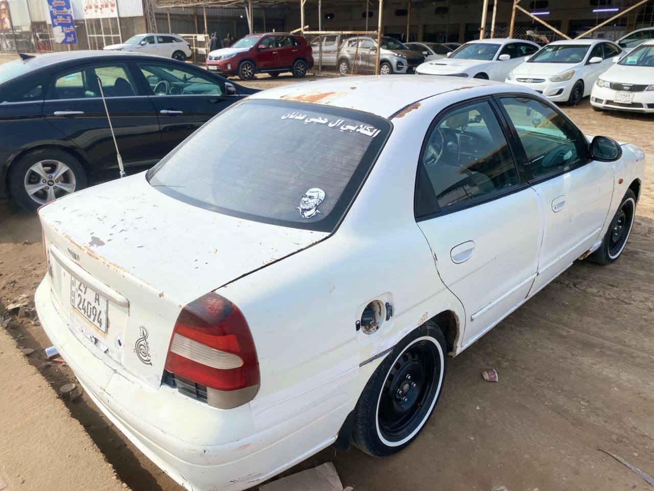 يا الله للبيع دايو نوبرة موديل 2001رقم واسط انكليزي سنوية ل31 بسمنة كير ومحرك حاوية  تخم تاير جديد قبل ٢٠يوم شادهن سيارة كاملة وكشرها كدامك واضح سعر 33ورقة وبيهة مجال عنوان واسط صويرة ‏‪***********‬‏
