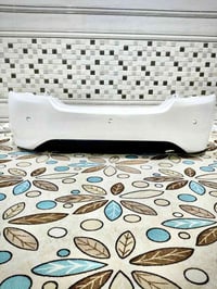 نيسان صني • دعامية خلفية • بابل الشوملي