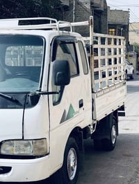 كيا 2000 قمارة وربع بترة 6جنكال مكينه وكير واكسن مكفولات مكينه لاصرف و...