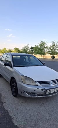 ميتسوبيشي لانسر • أربيل • لوحة ٧٣