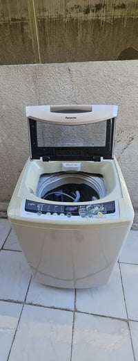 عندي غسالة اوتوماتيك مستخدمة ونظيفة مداخلة تصليح على وضع الشركة ١١كيلو...