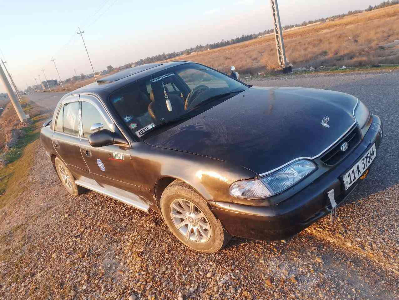 السلام عليكم سوناتا تو كير عادي مكينه مفتوح سنويه لل٢٩ صبغ عام للجماليه مكينه بيه  بخار تدفئة شغاله تبريد مايشتغل سعره ٣٨ بيه مجال بسيط مراوس هم يرهم حسب القناعه عنوان ديالى المقدادية تلفون ***********اتصال واساب
