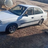 مكلف بلنشر سياره فيرنا  موديل ٢٠٠٢ رقم انبار نكليزي (كير عادي) كلشي شغ...