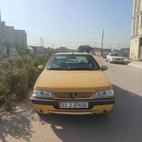 بيجو 405 السياره مكفوله بيها تكحيل فقط بلدوسه الي وره الصدر مكينه وكير...