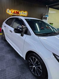 كورلا 2025 هايبرد سياره فول مواصفات للخير 1ع 1 ماشيه38 داخل احمر واسود...