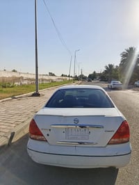 نيسان سني موديل 2009  بيها بارد بالجمالغ الامامي سياره ما بيها ضرب بس ...
