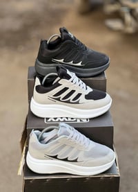 اسكتشر رجالي • نعل بيور ريشة • مقاسات ٤١-٤٥