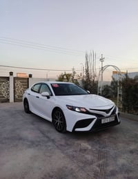 كامري SE • ٢٠٢٣ • ابيض ثلجي