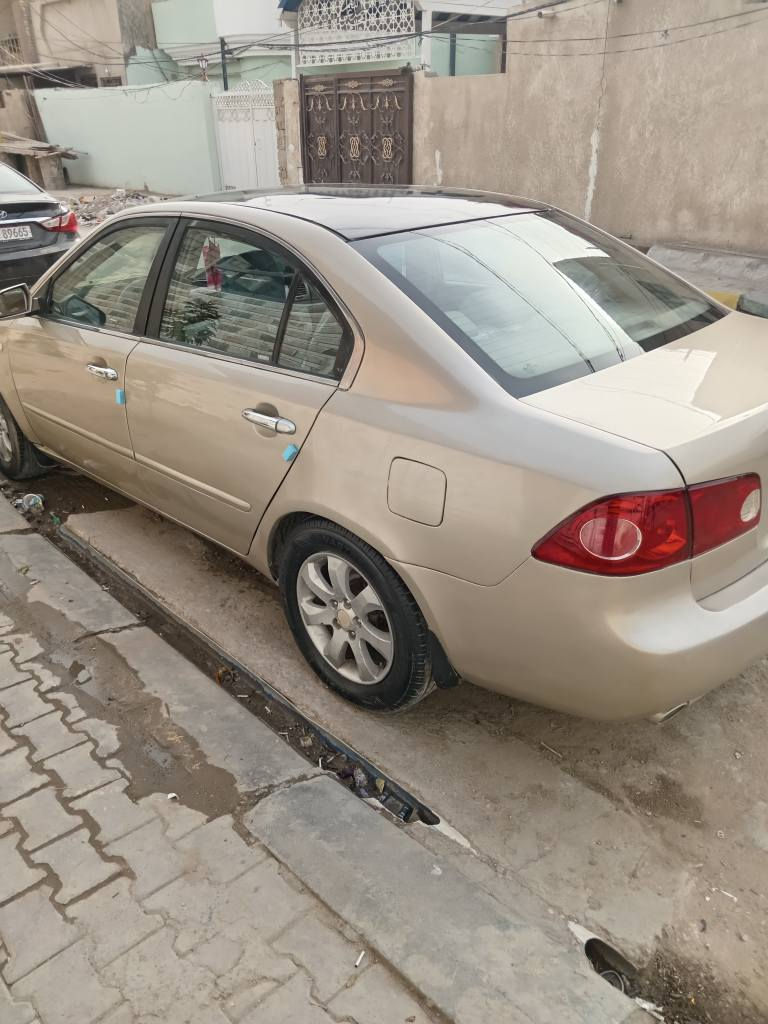 اوبتيما ٢٠٠٦ اوتو.. صبغ عام ضررها جامغ خلفي وباب معمره تعمير حلو جاهزه كير ومحرك سته سلندر مالكها يريد 
 تحويل تخم تاير حداديه كهربائيات جديده مكانها كربلاء سعرها ٧٠ وبيها مجال بسيط  للشراي.. ت *********** كربلاء, العراق
