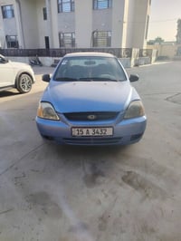 كيا ريو • ٢٠٠٤ • كير اوتو
