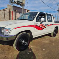 هايلوكس مديل 98 كفاله عامه  حداديه وتايرات جدد محرك كير شرط   كهربائيا...