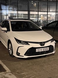 كورله هايبرد  موديل 2025 ماشيه 9 الف  رقم بغداد الجديد  سياره مكفوله م...