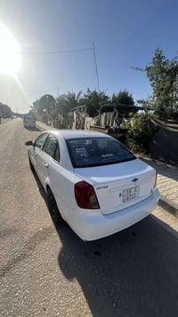 اوبترا 2006 • صفحة امامية مبدلة • مكينة وكير زين