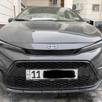 كورلا موديل 2024 SE هايبرد وارد امريكي لون اسمنتي  فول الفول  مواصفاته...