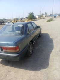 مازدا ١٩٩٠ • رقم كركوك • تاير جديد