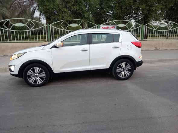 ‏كيا سبورتج 2014 خليجي  مكفولة ‏من ‏الصبغ السيارة جديدة ماشيه 98 الف
اللون ابيض  
‏مواصفات السيارة 
بصمه
ثلاجه جكمجه
تبريد قطعتين
بانوراما 
محرك 2400 دوش‏
‏ تبريد جكمجه 
‏ حساس خلفي 
مانع انزلاق
فور ويل
مانع انحدار 
‏ وكاميرا
كشن جلد هيتر 
كشن  كهرباء
دمام خلفي
كشن تبريد
تبريدشاشه بيانو قطعتين جلفي امامي 
شاشه 
‏صدر جديد 
يدات نيكل
ويل ١٨
اشاير مري
تايرات جدد
‏تبريد ثلج 
‏مكان السيارة بغداد البياع  
محرك مفتوح
السعر  مجال قليل بيهه 167
 بي واتساب ‭0776 551 8520‬ 
***********
رقم بغداد دولي 
مكلف بالنشرا بيهه بارد قليل
