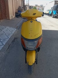 دراجة • بس كابريتر • عليها مجال