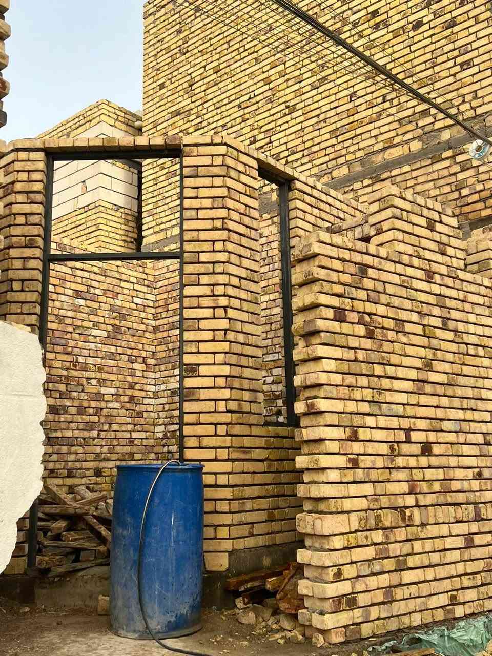 خلفه بناء متفرغ مكاني سوق الشيوخ ***********
