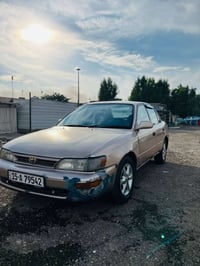 كورلا موديل 1992  صبغ جمايلة  تفاصيل / محرك/1600  صدر امامي خلفي جديد ...