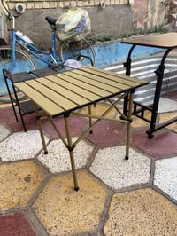 كلمن • طاولة