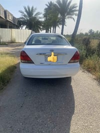 نيسان سني 2009 ياباني كير محرك تبريد مكفول رقم بغداد باسمي السعر 75$ و...
