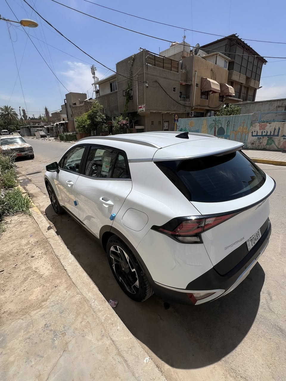 لبيع سبورتج ٢٢ شاشه كامره  مكفوله حساسا امامي خلفي ماشيه ٢٤ بسمي بغداد ***********
