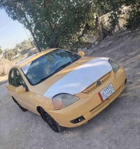 كيا ريو ٢٠٠٤ • محرك ١٦٠٠ • رقم بغداد