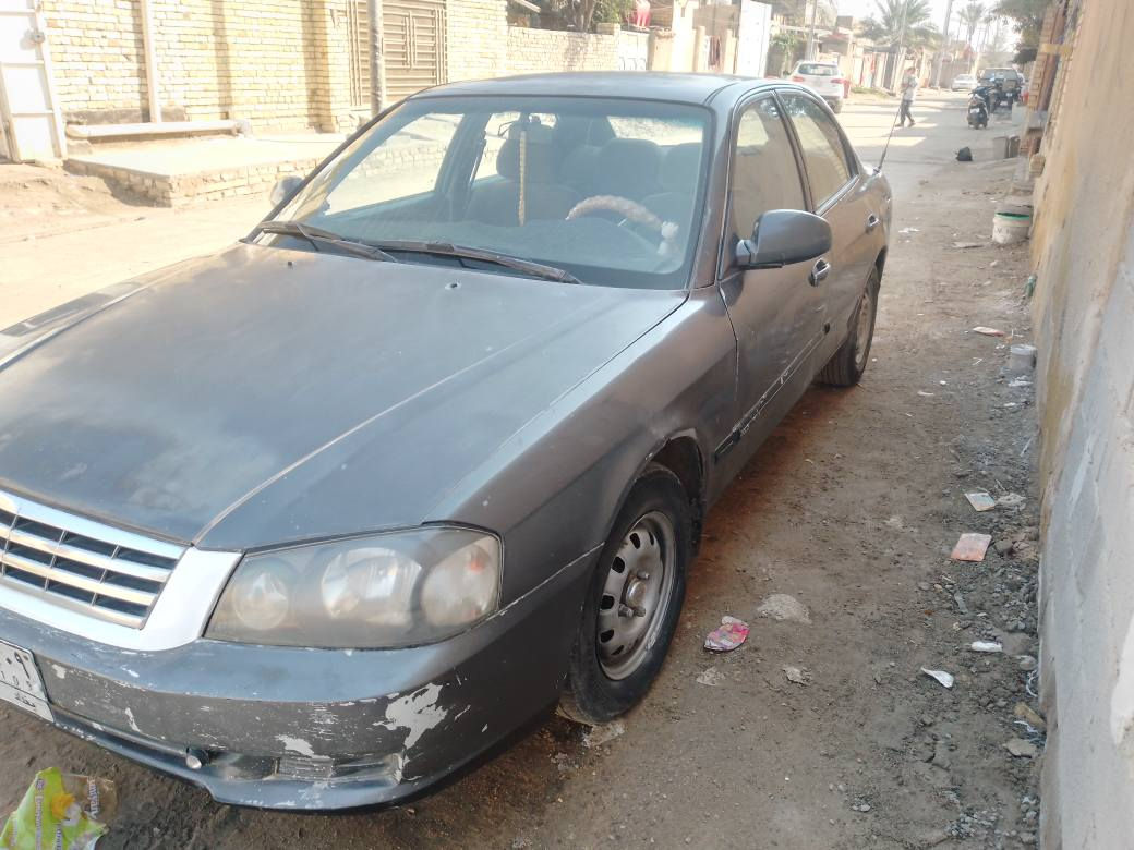 كيا اوبتيما موديل 2001 بغداد سنويه نافذه مكفوله ضربه كص جارده  بلاد السعر 45 وبيه مجال عنوان قلعة سكر تليفون *********** الرفاعي, ذي قار
