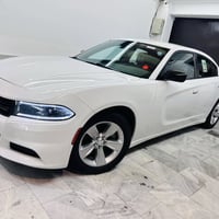 دوج جارجر موديل2023 أصل رقم بغداد بسمي السيارة وارد خليجي ومعروف مواصف...