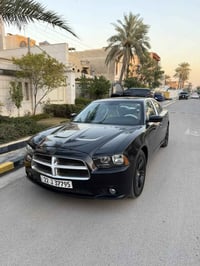 جارجر 2013 وارد كندي  داخلة كلين وهنا بالعراق صار بيهة صبغ جاملغ خلفي ...